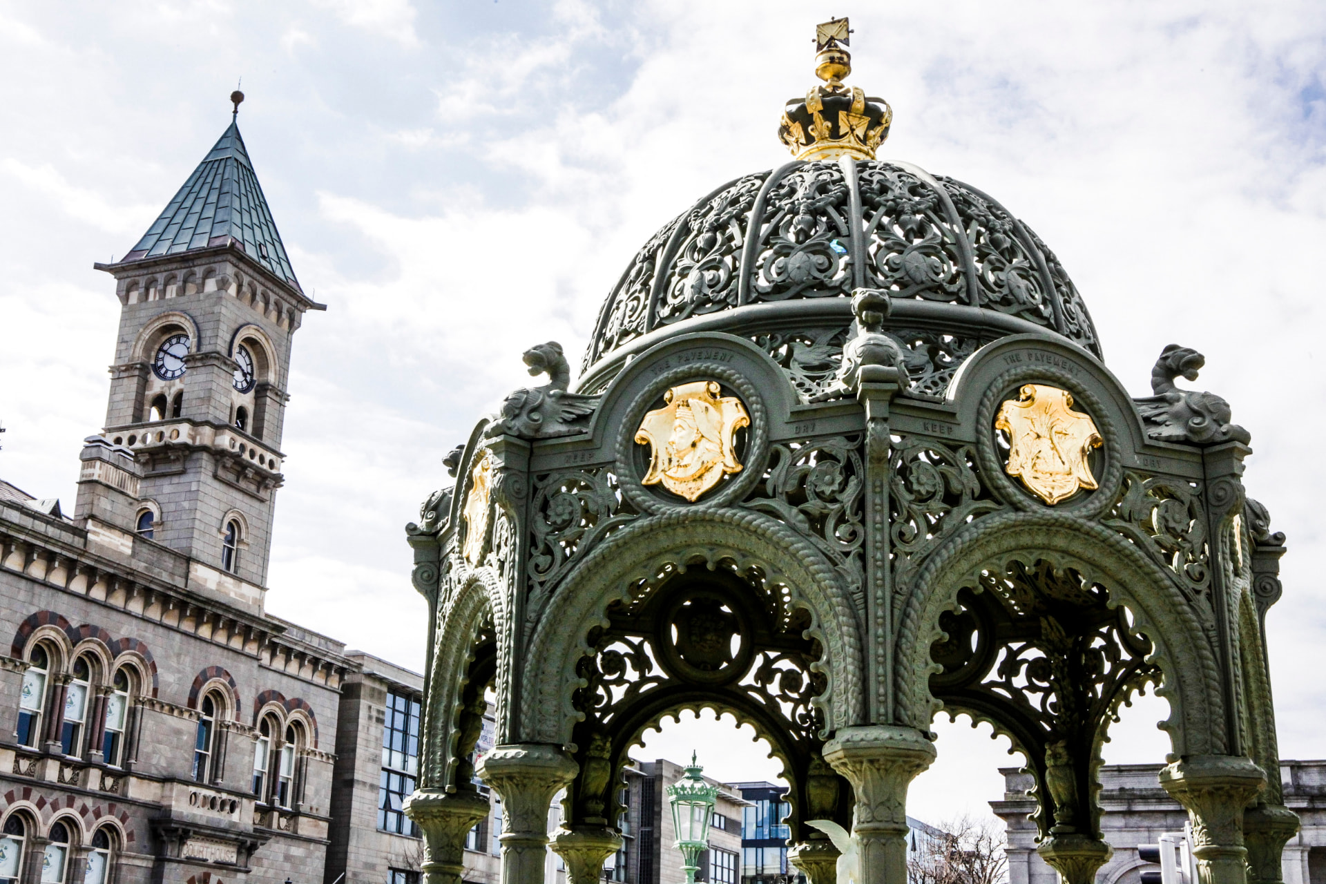 The Victorian people's park gazebo with the clock tower behind